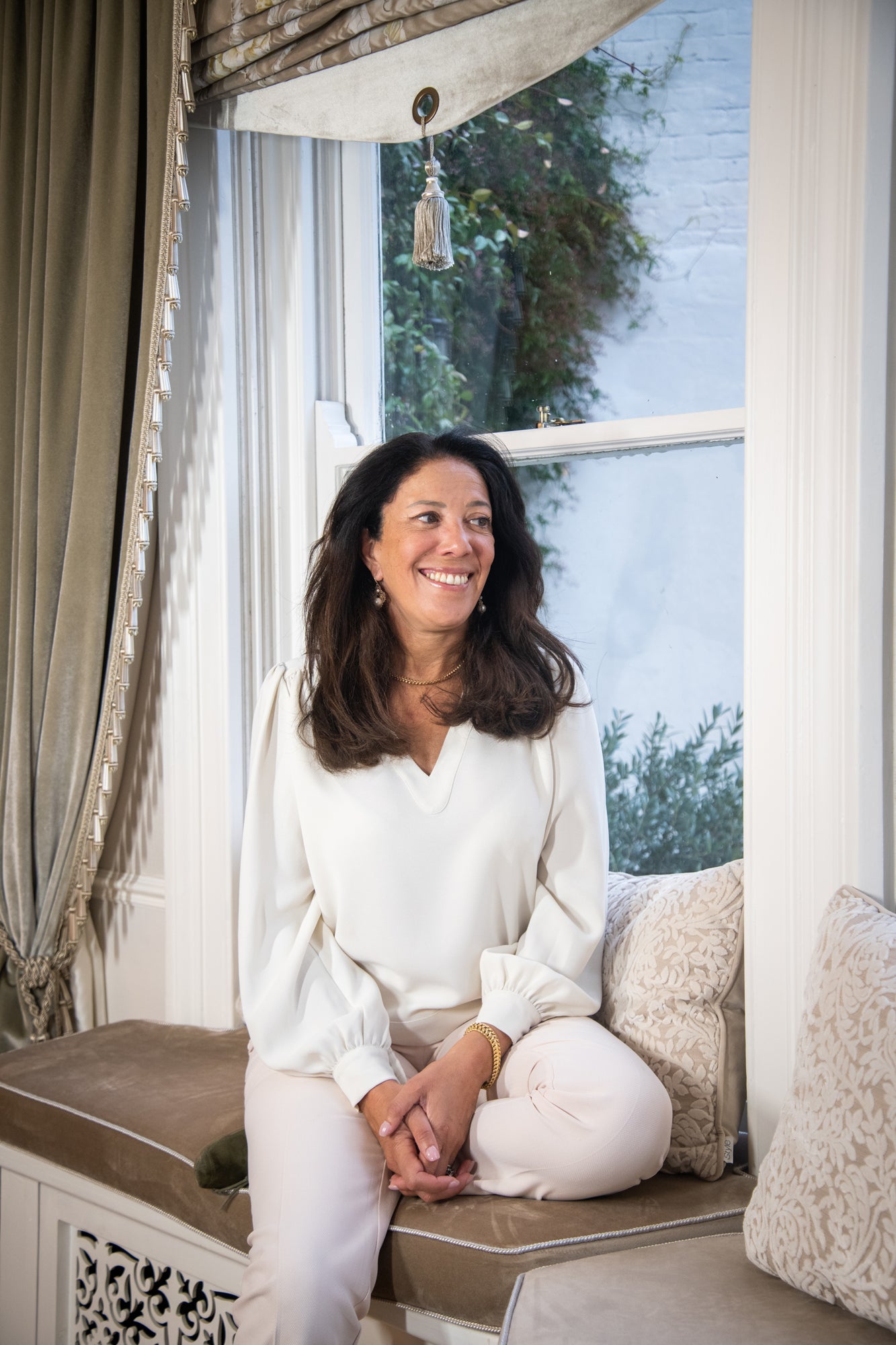 image of FOLI founder on window seat 