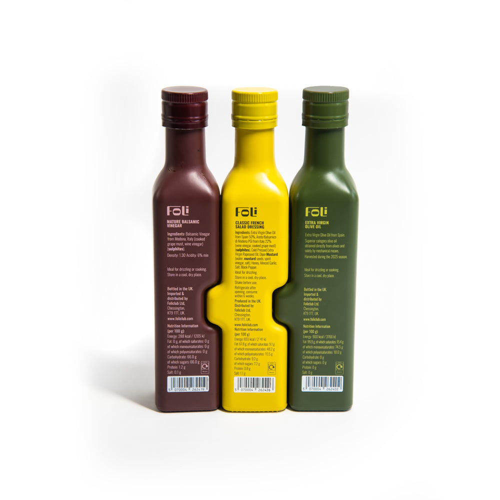 Three bottles of FOLI products in different colours on a white background